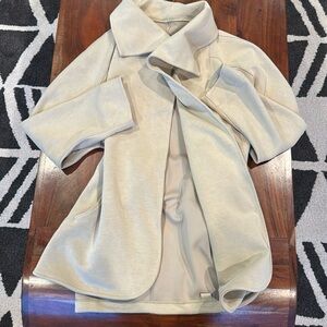 Tan, LuluLemon small. Jacket, tie in front or back